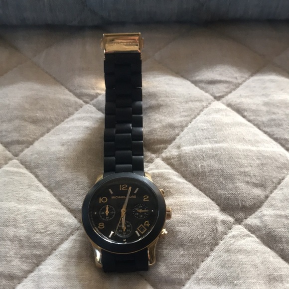Beautiful Michael Kors black and gold watch